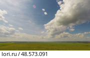 Summer landscape with cloudy sky, view from hill, timelapse, 4k. Стоковое видео, видеограф Михаил Коханчиков / Фотобанк Лори