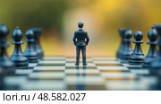 Businessman standing on a chessboard contemplating strategy at sunset. Бизнесмен стоит на шахматной доске и обдумывает стратегию на закате. Стоковое AI-изображение, AI-художник Katsiaryna Repich / Фотобанк Лори