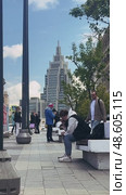 Pedestrians on the Triumfalnaya Square. View of the business center "Armory" and the Garden ring. Russia. Moscow. 13.05.2025. Редакционное видео, видеограф Ярославский Максим / Фотобанк Лори