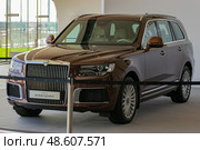 Aurus Komendant luxury premium SUV on display at an exhibition stand. Редакционное фото, фотограф Антон Вахрушев / Фотобанк Лори