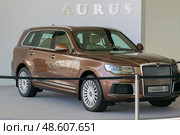 Aurus Komendant luxury premium SUV on display at an exhibition stand. Редакционное фото, фотограф Антон Вахрушев / Фотобанк Лори