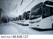 Fleet of modern buses in a well-lit transportation hub. Стоковое AI-изображение, AI-художник Михаил Коханчиков / Фотобанк Лори