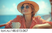 A woman relaxes with a cup of coffee on a boat, dressed in a light shirt and sunhat, basking in the warm sun and beautiful ocean views. Стоковое AI-изображение, AI-художник Данила Большаков / Фотобанк Лори