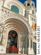 A mosaic bas-relief with an icon of the Savior and Fragments of facade decoration with stucco at the St. Nicholas Cathedral in Kronstadt. The main entrance to the cathedral. Стоковое фото, фотограф Оксана Медведева / Фотобанк Лори