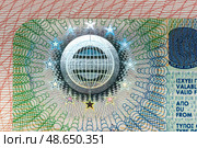 Close-up of a Schengen visa with detailed security features. Стоковое фото, фотограф Емельянов Евгений Викторович / Фотобанк Лори