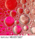 The image is a close up of a large number of small red bubbles. Стоковое AI-изображение, AI-художник Ярославский Максим / Фотобанк Лори