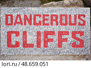 The warning signs “Dangerous cliffs”. Cornwall. England. Great Britain. (2009 год). Стоковое фото, фотограф Сергей Пристяжнюк (Serg Zastavkin) / Фотобанк Лори