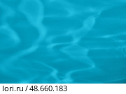 mint blue colored abstract background with light and shadows caustic effect. Стоковая иллюстрация, иллюстратор Александра Конопля / Фотобанк Лори