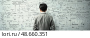 An individual stands in front of a wall filled with intricate diagrams and notes, deep in thought about the data presented. Стоковое AI-изображение, AI-художник Данила Большаков / Фотобанк Лори