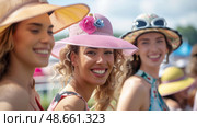 woman in hat at ascot racecourse. Стоковое AI-изображение, AI-художник Anastasy Yarmolovich / Фотобанк Лори