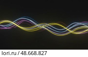 Glowing neon lines in vibrant colors moving in a dark background. Стоковое AI-видео, аниматор KATERINA AI / Фотобанк Лори