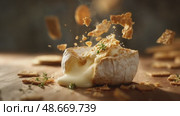 Baked camembert cheese wheel with falling crackers and thyme. Стоковое AI-видео, аниматор Юрий Поздников / Фотобанк Лори