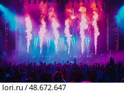 The final bow, the stage behind the performers erupting in a controlled inferno, Стоковое AI-изображение, AI-художник Anastasy Yarmolovich / Фотобанк Лори