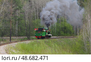 Паровоз Гр-318 во время технического рейса движется тендером вперед по станции Екатеринбург-Детский, Екатеринбургская ДЖД, Свердловская область. Редакционное фото, фотограф Алексей Иванов / Фотобанк Лори
