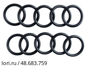 Set of 10 black rubber washers isolated on white background. Automotive spare parts for repair or replacement. Ideal for catalog or online store display. Стоковое фото, фотограф Татьяна Терехина / Фотобанк Лори