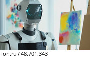 robot ai artificial intelligence is learning creativity by using a painter palette, doing a artwork, concept autonomous robot is going to be an artist. Стоковое AI-видео, аниматор ALLA YURTAYEVA / Фотобанк Лори
