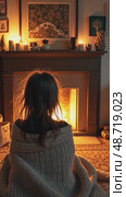 A wide-angle view of a cozy living room with a crackling fireplace, where a girl sits wrapped in a blanket, her oversize cardigan shining in fireplace light with Christmas festive decorated interior. Стоковое AI-видео, аниматор Sergey Grishin / Фотобанк Лори