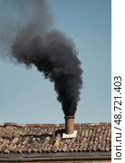 Dark smoke rises ominously from the chimney of the Sistine Chapel, signaling the ongoing papal election. Crowds gather below, anticipating news of the new pope Generative AI. Стоковое AI-изображение, AI-художник Юлия Петровская / Фотобанк Лори