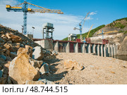 Строительство Усть-Среднеканской ГЭС на Колыме (2012 год). Редакционное фото, фотограф Павел Просянов / Фотобанк Лори