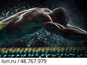 A man is swimming in a pool and is splashing water everywhere. Стоковое AI-изображение, AI-художник Ярославский Максим / Фотобанк Лори