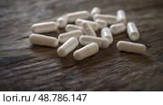 medicine white pill capsules ai generated. Стоковое AI-изображение, AI-художник Vectorwin / Фотобанк Лори