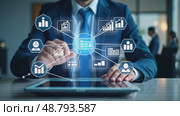 A person in a business suit working on a laptop with virtual icons related to project management, featuring task lists analysis and business processes flowing chart. Стоковое AI-видео, аниматор Sergey Grishin / Фотобанк Лори