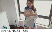 Housewife checking clean white shirt freshness. Стоковое видео, видеограф Константин Шишкин / Фотобанк Лори