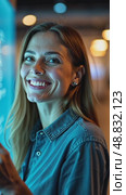 A woman smiling while interacting with a hologram, front view, bright lighting, friendly color palette with soft blues and yellows. future hi-tech interface communication concept. Стоковое AI-видео, аниматор Sergey Grishin / Фотобанк Лори