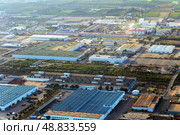 Aerial view of industrial area near Algiers airport - hangars and warehouses of logistics hub. Republic of Algeria. Стоковое фото, фотограф Евгений Ткачёв / Фотобанк Лори