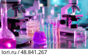 Colorful laboratory setup with test tubes and microscopes during a scientific experiment. Стоковое AI-изображение, AI-художник Сергей Толмачёв / Фотобанк Лори