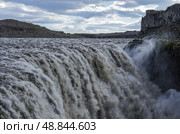 Водопад Деттифосс. одна из лучших достопримечательностей Исландии. Деттифосс - самый мощный водопад в Исландии и во всей Европе (2014 год). Стоковое фото, фотограф Дымов Игорь / Фотобанк Лори