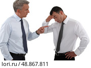 Chief taunting employee. Стоковое фото, агентство Ingram Publishing / Фотобанк Лори
