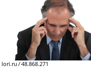 Man with headache. Стоковое фото, агентство Ingram Publishing / Фотобанк Лори