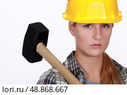 Woman with a sledgehammer. Стоковое фото, агентство Ingram Publishing / Фотобанк Лори