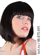 close-up portrait of glamorous blue-eyed brunette with fringe. Стоковое фото, агентство Ingram Publishing / Фотобанк Лори