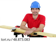 Craftsman with wood lath. Стоковое фото, агентство Ingram Publishing / Фотобанк Лори