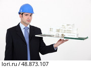 Architect unsure about a design. Стоковое фото, агентство Ingram Publishing / Фотобанк Лори