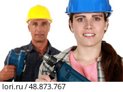 Male and female laborers. Стоковое фото, агентство Ingram Publishing / Фотобанк Лори