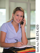 Young secretary on the phone. Стоковое фото, агентство Ingram Publishing / Фотобанк Лори