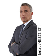 Portrait of a stoic businessman. Стоковое фото, агентство Ingram Publishing / Фотобанк Лори