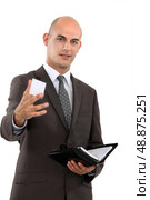 Holding out his business card. Стоковое фото, агентство Ingram Publishing / Фотобанк Лори