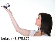 Woman holding a webcam. Стоковое фото, агентство Ingram Publishing / Фотобанк Лори
