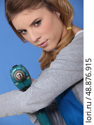 Woman with a drill. Стоковое фото, агентство Ingram Publishing / Фотобанк Лори