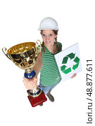 Tradeswoman receiving an award. Стоковое фото, агентство Ingram Publishing / Фотобанк Лори