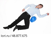 Architect pretending to be dead. Стоковое фото, агентство Ingram Publishing / Фотобанк Лори