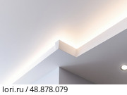 Ceiling close-up. Classic interior. LED Retrofit Bulb into Ceiling Fixture. Cornice. Installing. Decorative Ceiling crown molding intersection. Wall Corner Architecture Decor. Angular ceiling skirting. Стоковое AI-изображение, AI-художник Марина Демидюк / Фотобанк Лори
