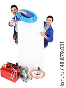 male duo of plumbers with tools. Стоковое фото, агентство Ingram Publishing / Фотобанк Лори