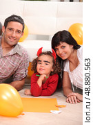 Young family at Halloween. Стоковое фото, агентство Ingram Publishing / Фотобанк Лори