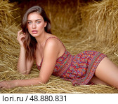 Village beauty in the hayloft. Стоковое AI-изображение, AI-художник Сергей Елизарьев / Фотобанк Лори