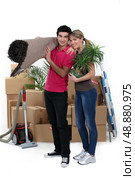 couple arranging their new apartment. Стоковое фото, агентство Ingram Publishing / Фотобанк Лори